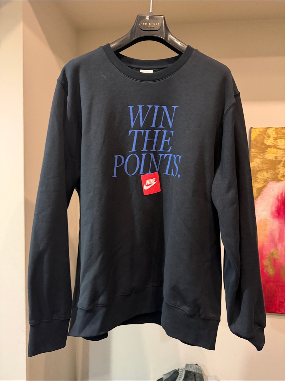Nike Black Crewneck Sweatshirt with Blue Typography and Red Logo